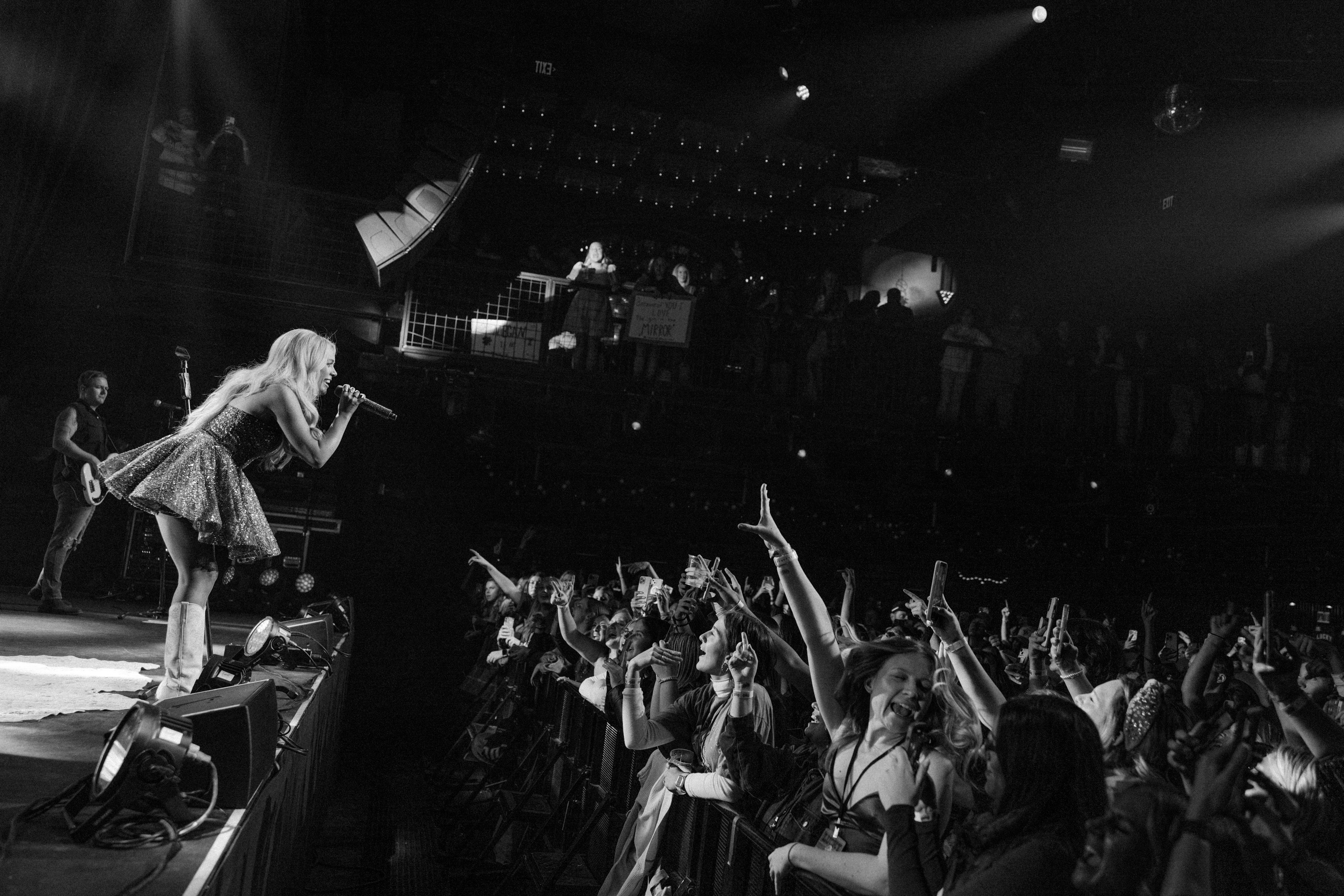 Megan Moroney performing for a packed crowd at Nashville’s Brooklyn Bowl